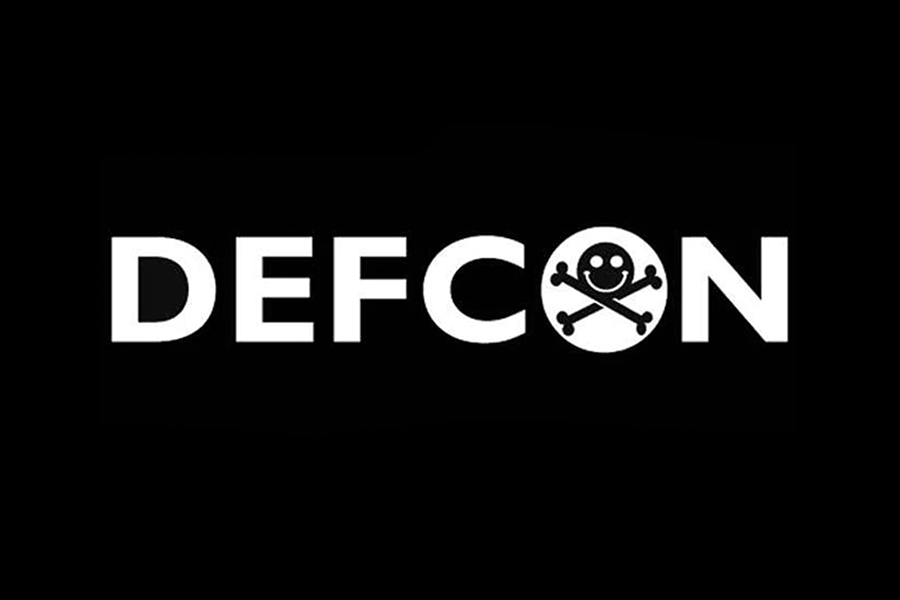 white DEF CON logo on a black background