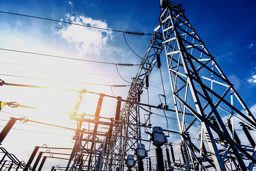 Power lines and a blue sky